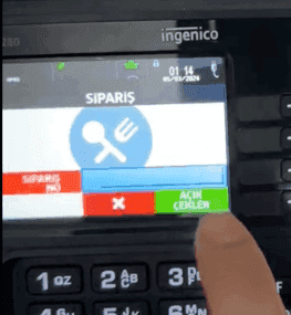Ingenico cihaz ekranında SİPARİŞ sayfası ve yeşil AÇIK ÇEKLER tuşu